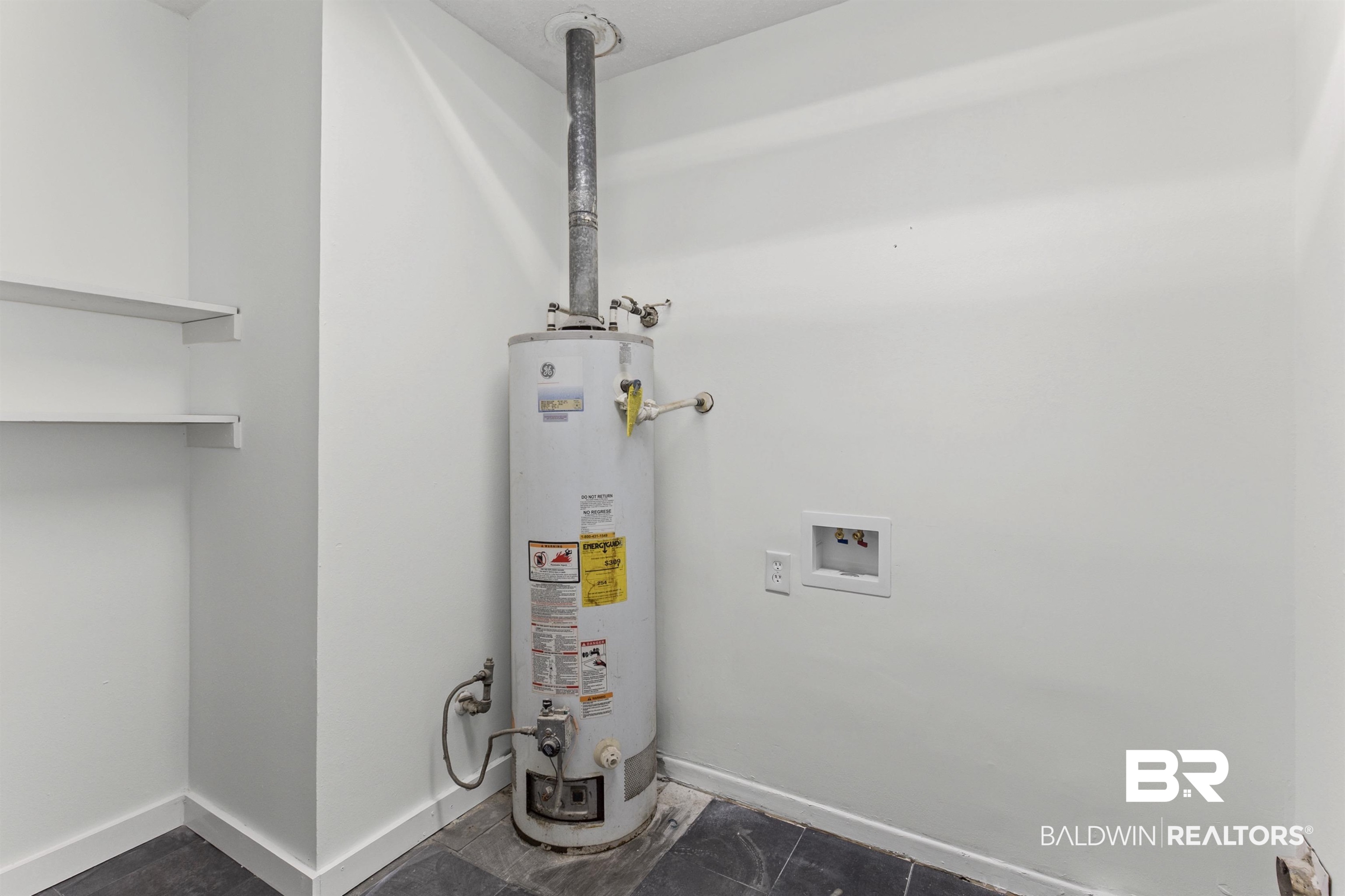 7795 Bellingrath Road Theodore, AL 36582 - Photo 16 of 18 Utilities with water heater