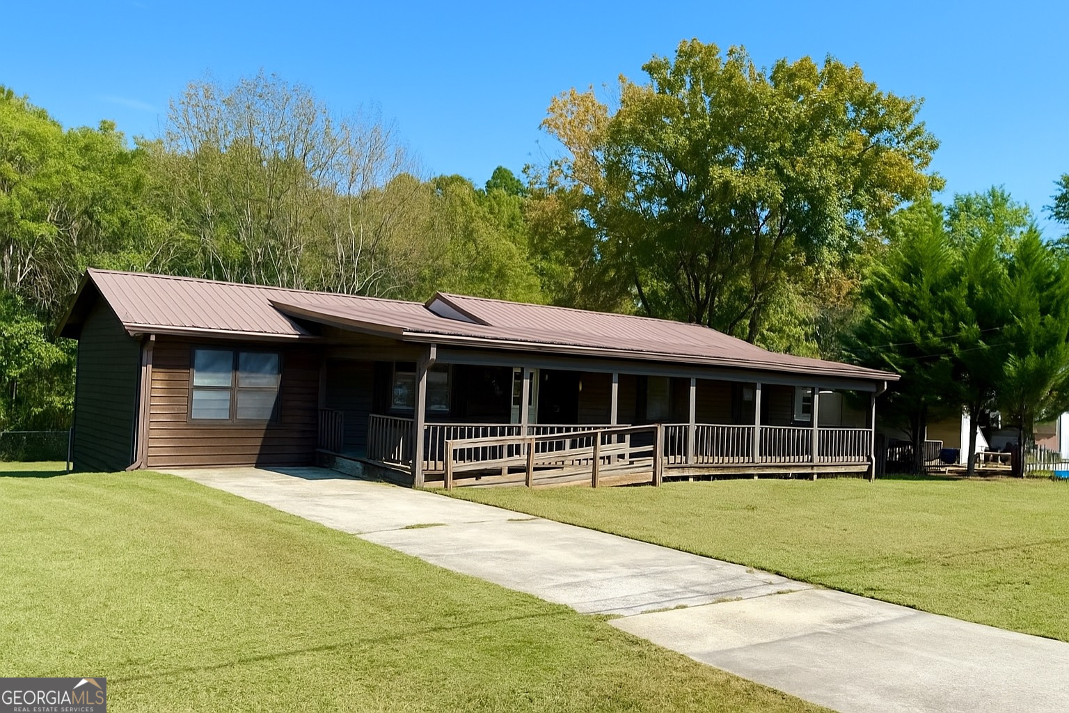 233 Longmeadow Drive Northwest Rome, GA 30165 - Photo 1 of 19 a front view of building with yard and green space