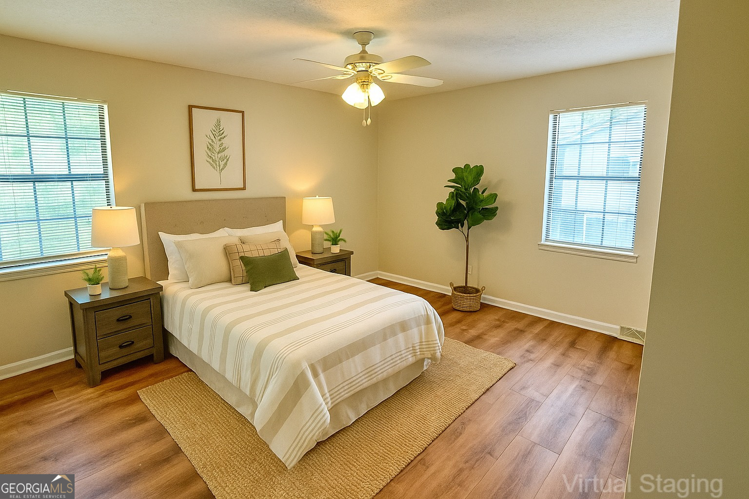 233 Longmeadow Drive Northwest Rome, GA 30165 - Photo 9 of 19 a bedroom with a bed chandelier and a window