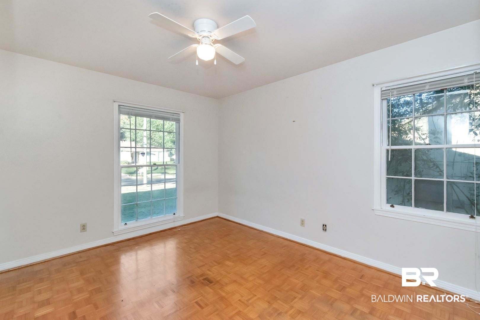 5517 Vanderbilt Drive Mobile, AL 36608 - Photo 23 of 33 Unfurnished room featuring ceiling fan and light parquet floors