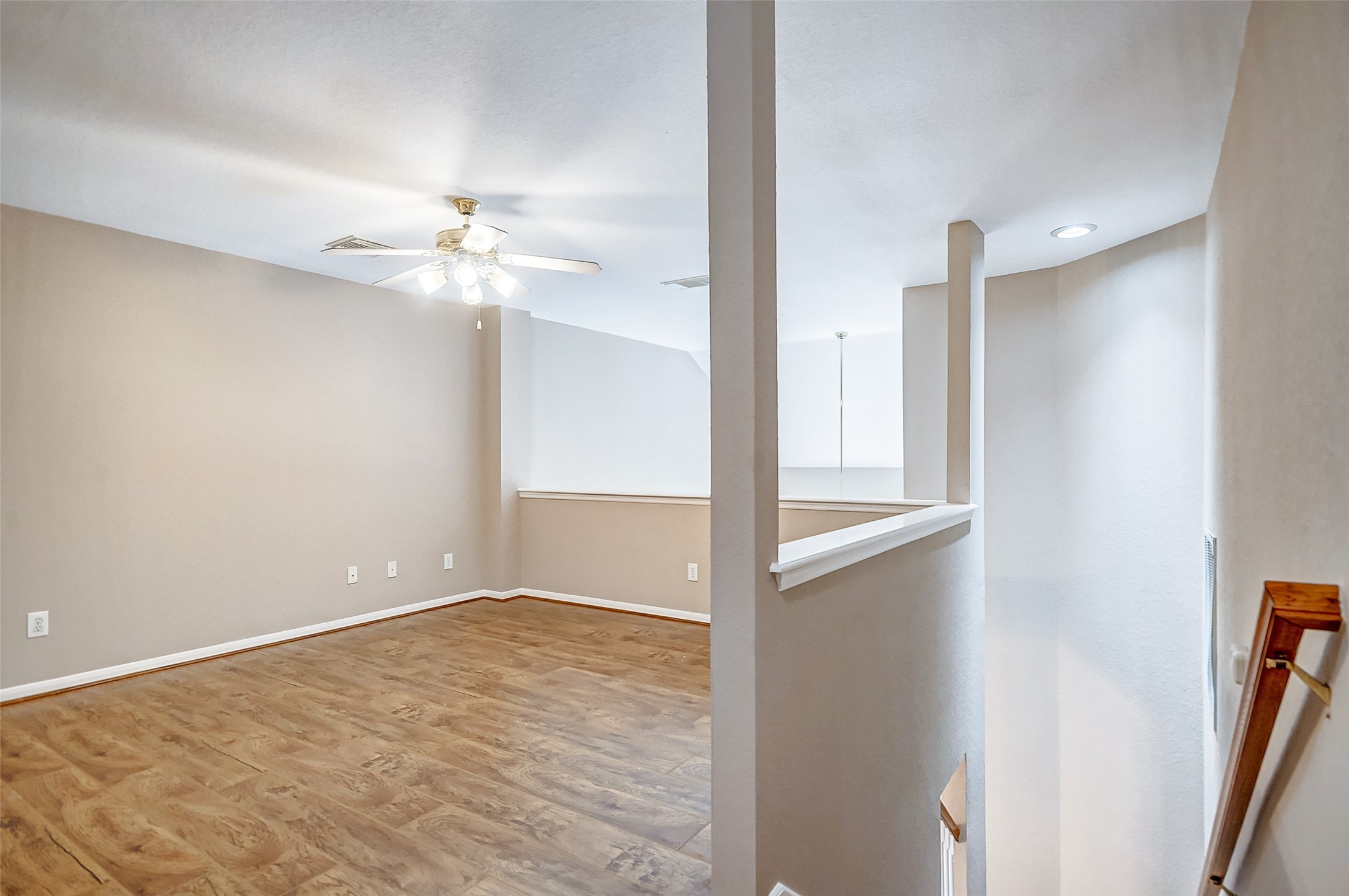 2022 Ridge Wood Lane Sugar Land, TX 77479 - Photo 12 of 21 an empty room with closet and a ceiling fan