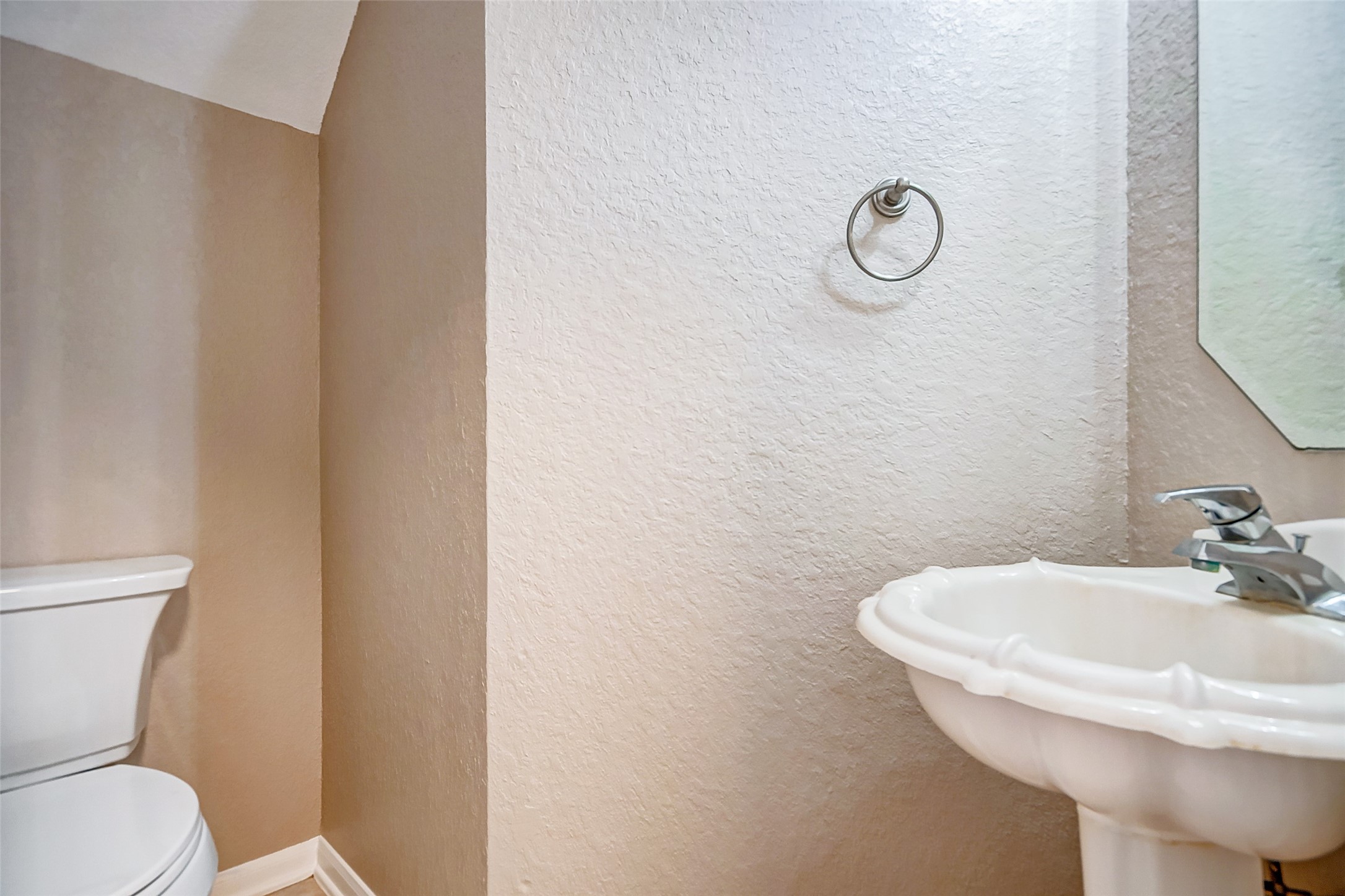 2022 Ridge Wood Lane Sugar Land, TX 77479 - Photo 16 of 21 a bathroom with a sink and a toilet