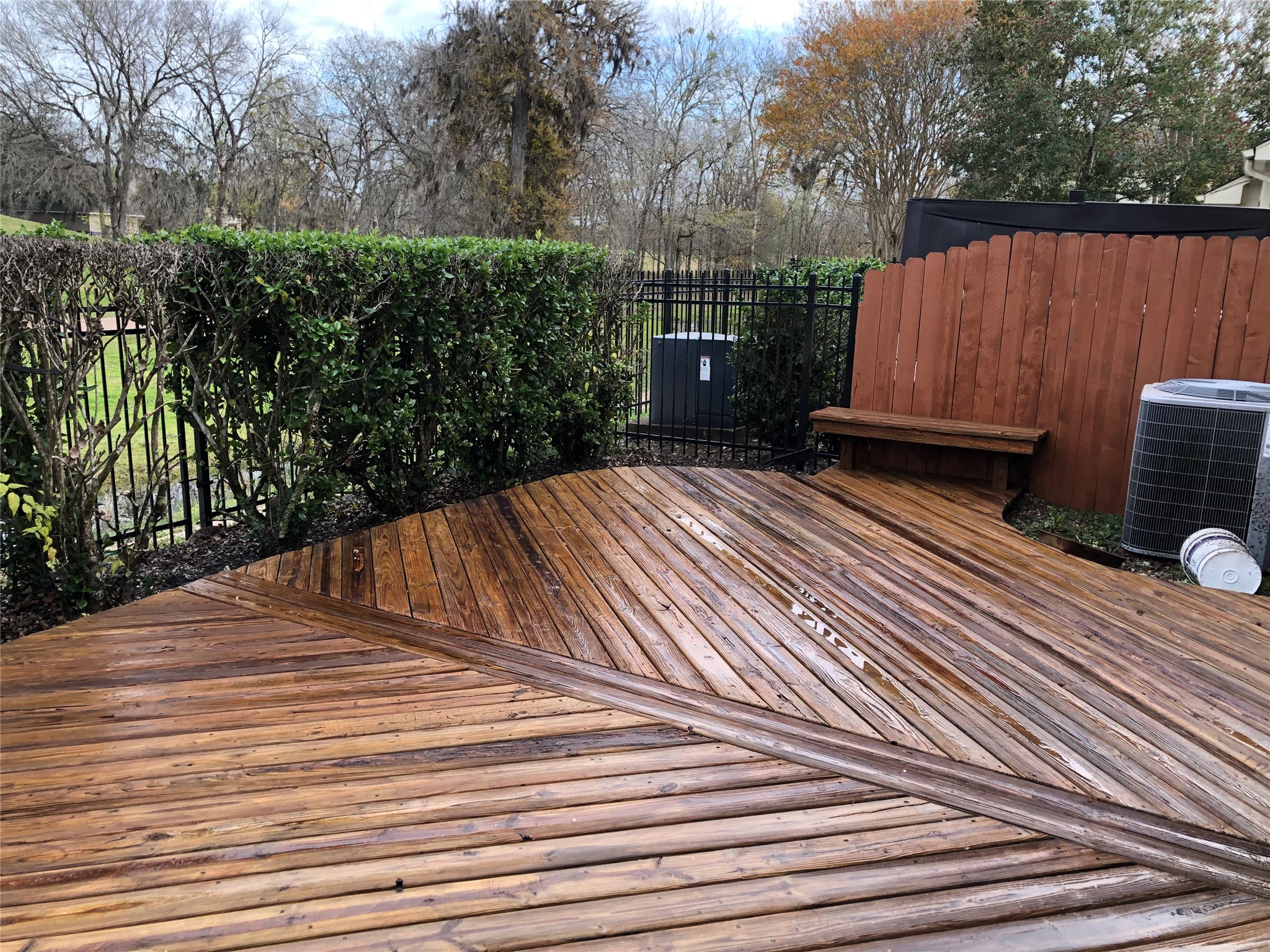 2022 Ridge Wood Lane Sugar Land, TX 77479 - Photo 19 of 21 a view of a backyard with wooden fence