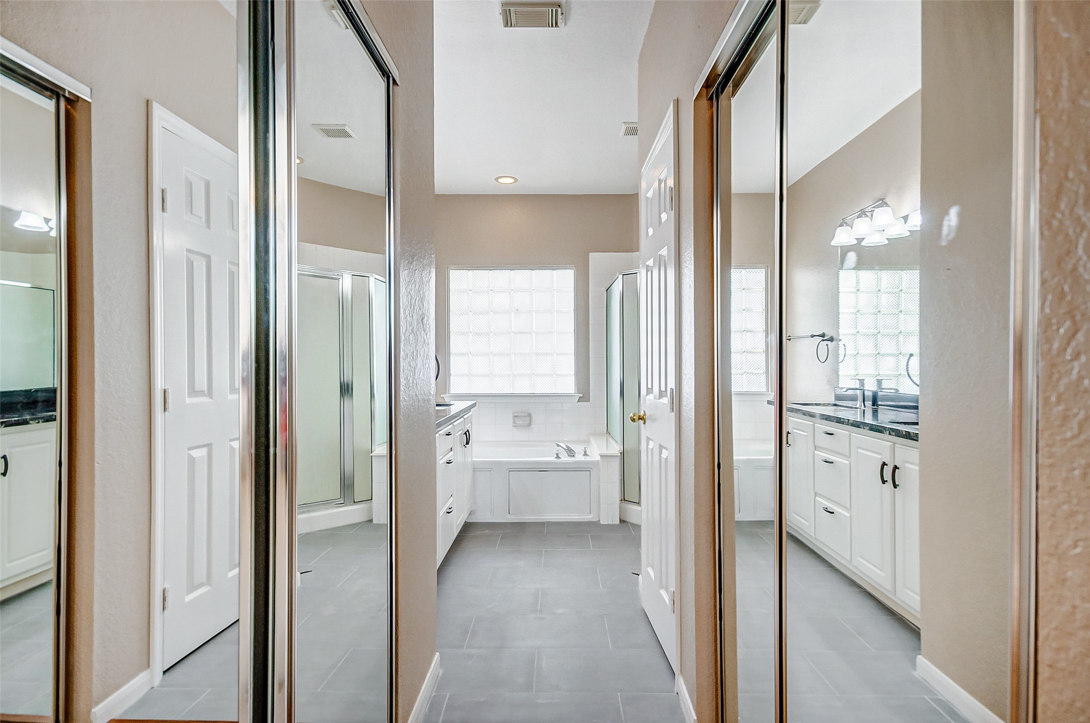 2022 Ridge Wood Lane Sugar Land, TX 77479 - Photo 10 of 21 a view of a bathroom with a shower and a bathroom