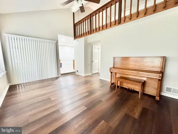a view of livingroom with hardwood and furniture