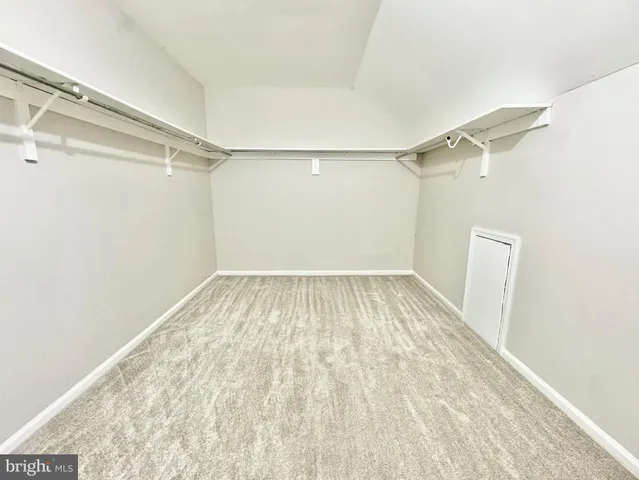 a view of a room with racks on the wall