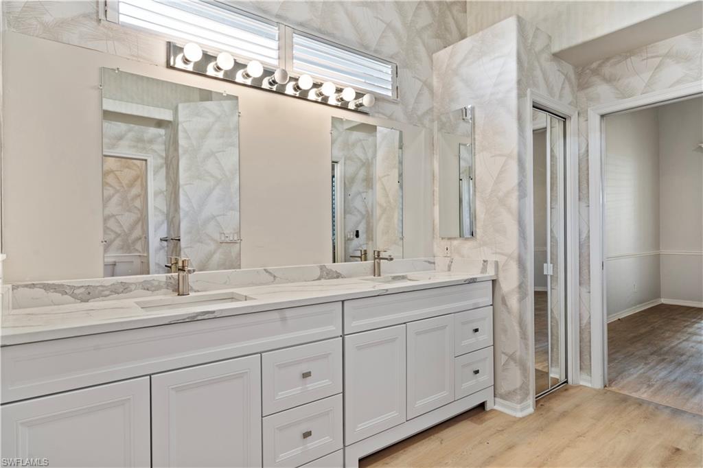 20751 Rivers Ford Estero, FL 33928 - Photo 7 of 36 Bathroom featuring double vanity and light wood-type flooring