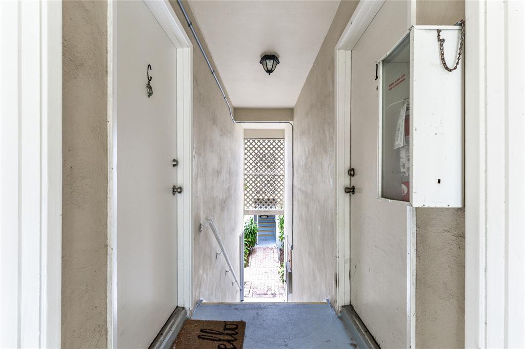 312 Southeast 10th Avenue, Unit C Pompano Beach, FL 33060 - Photo 23 of 23 a view of an entryway with wooden floor
