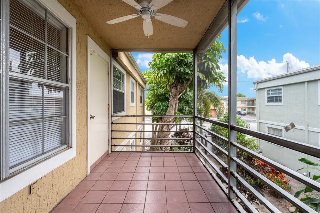312 Southeast 10th Avenue, Unit C Pompano Beach, FL 33060 - Photo 10 of 23 a view of a balcony with chairs