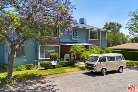 a car parked in front of a house