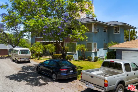 a car parked in front of a house