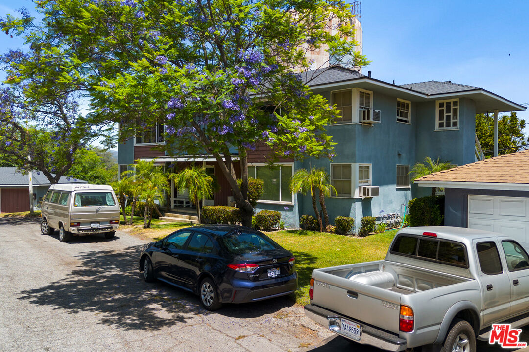 1648 Raymond Hill Road South Pasadena, CA 91030 - Photo 2 of 9 a car parked in front of a house