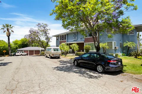 a car parked in front of a house