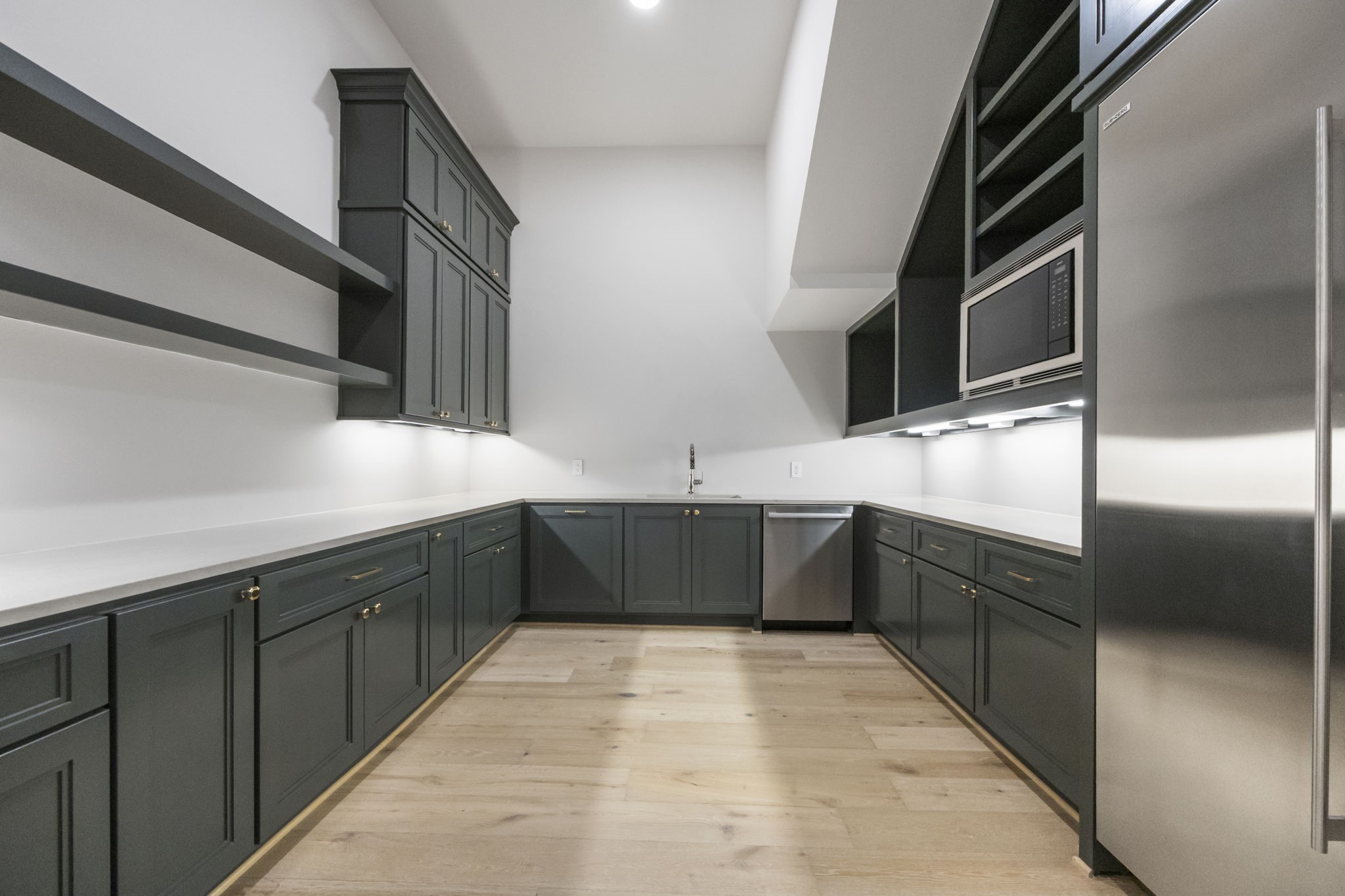 4233 Two Gun Way Katy, TX 77494 - Photo 14 of 47 Catering/prep kitchen downstairs with Wolfe and Sub Zero appliances.