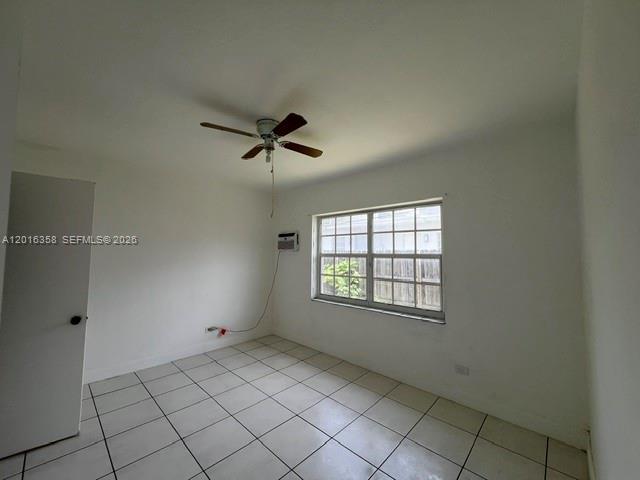 441 Southwest 10th Street, Unit 4 Miami, FL 33130 - Photo 5 of 18 a view of a room with window and ceiling fan