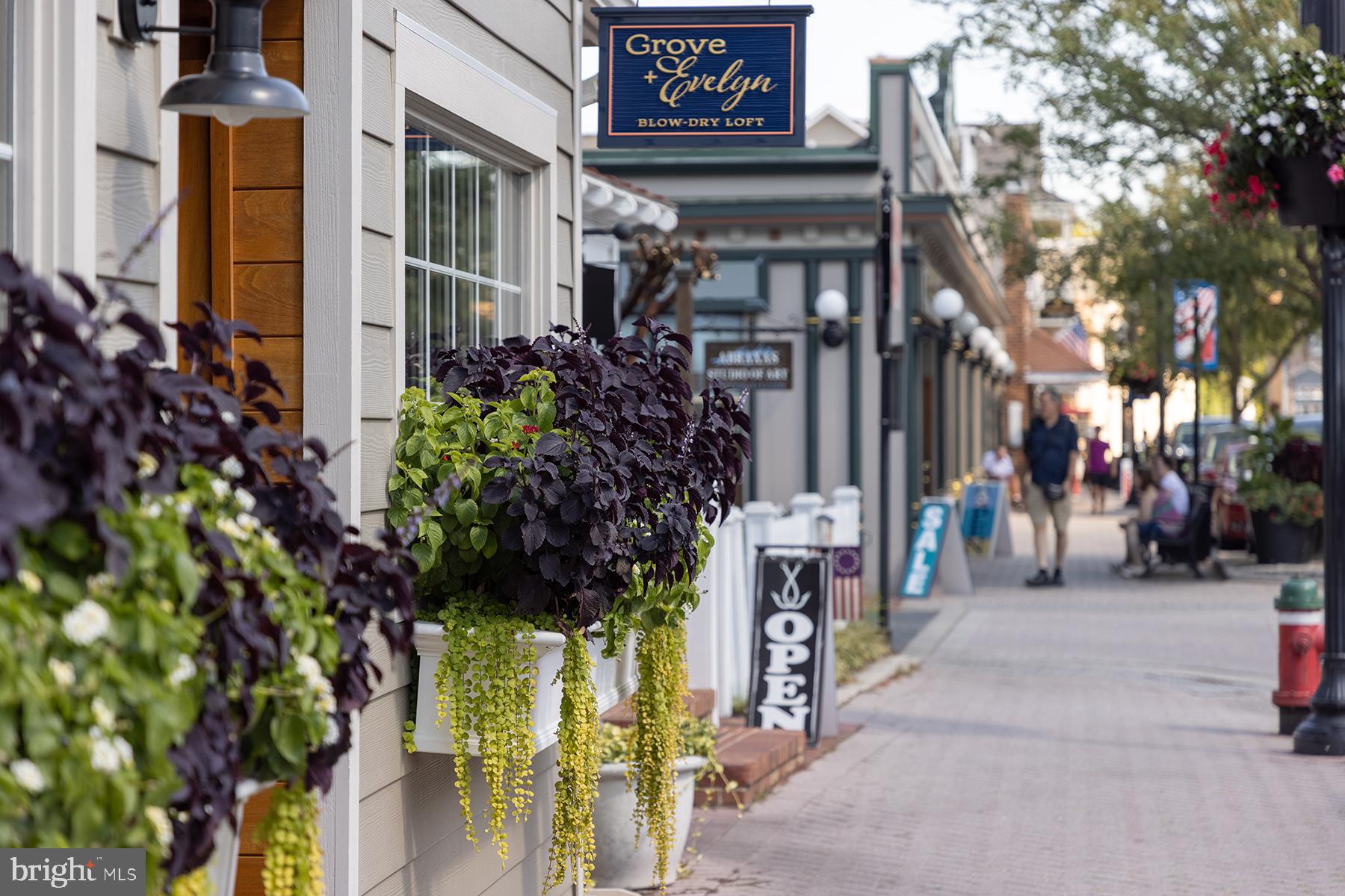 18822 Melville Way Georgetown, DE 19947 - Photo 22 of 24 a view of path along with retail shop and buildings