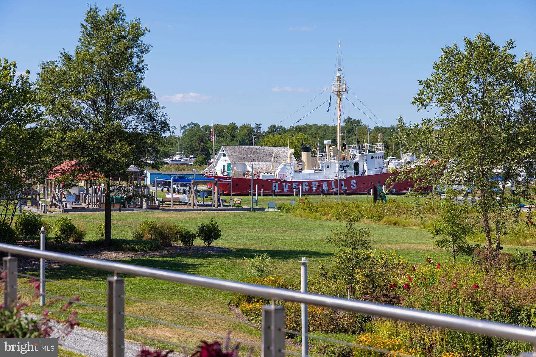 18822 Melville Way Georgetown, DE 19947 - Photo 23 of 24 a view of a garden and trees