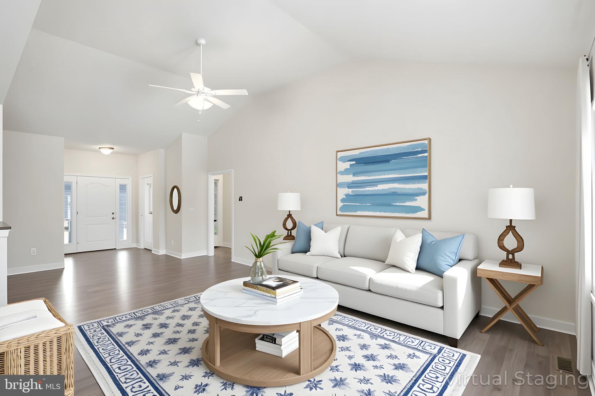 18822 Melville Way Georgetown, DE 19947 - Photo 4 of 24 a living room with furniture and a table