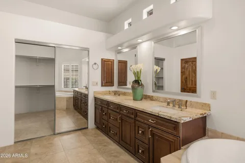 a view of storage and utility room with washer and dryer