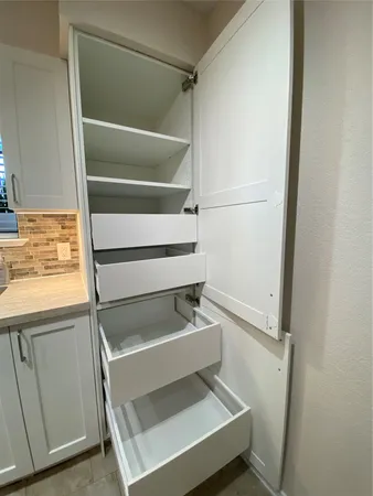 a utility room with washer and dryer
