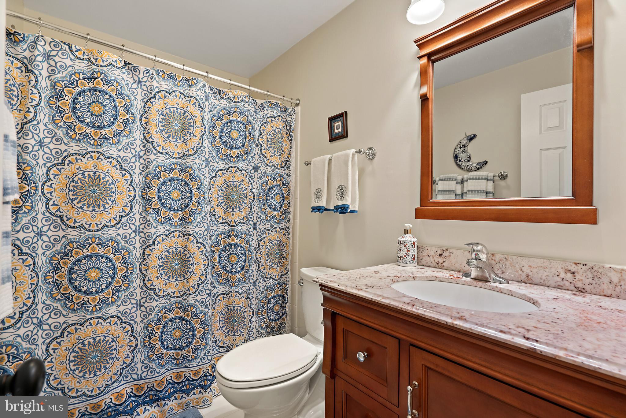 509 Foxcroft Road Warrenton, VA 20186 - Photo 19 of 38 Main level bathroom with granite topped vanity