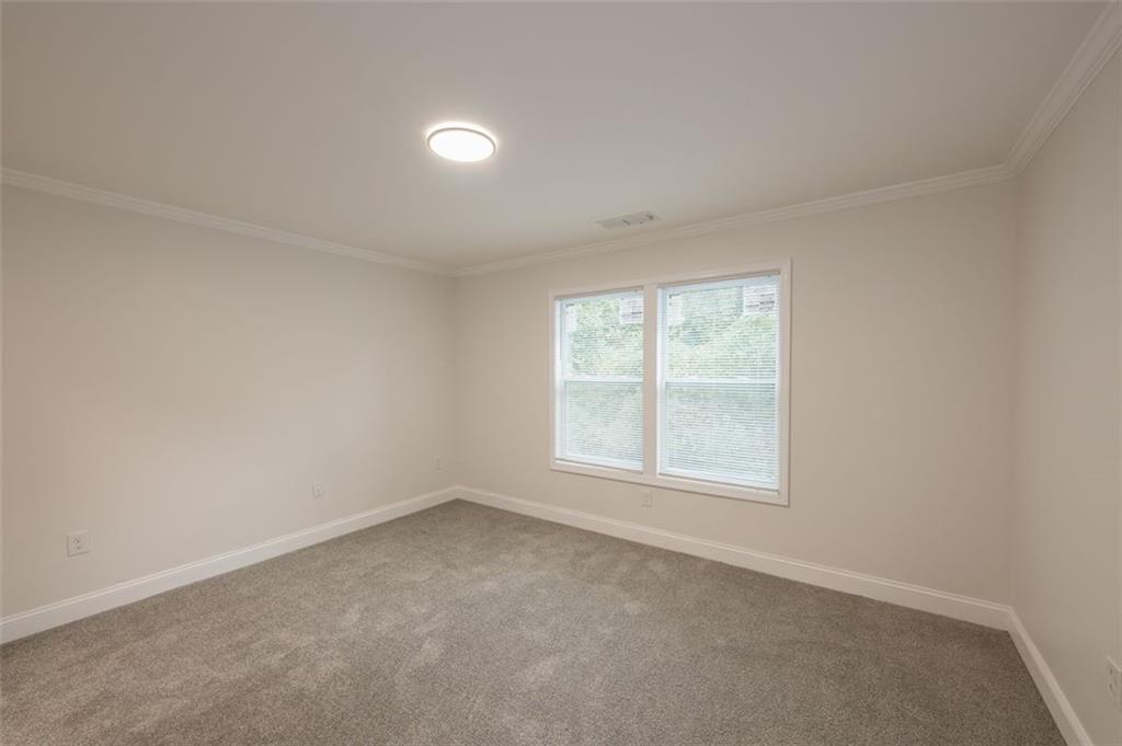 2027 Lois Place Northwest, Unit A Atlanta, GA 30318 - Photo 15 of 23 an empty room with a window