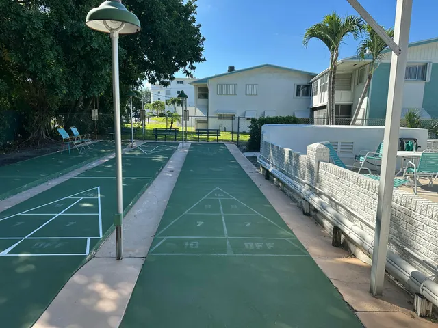 a view of a car parked in front of a building