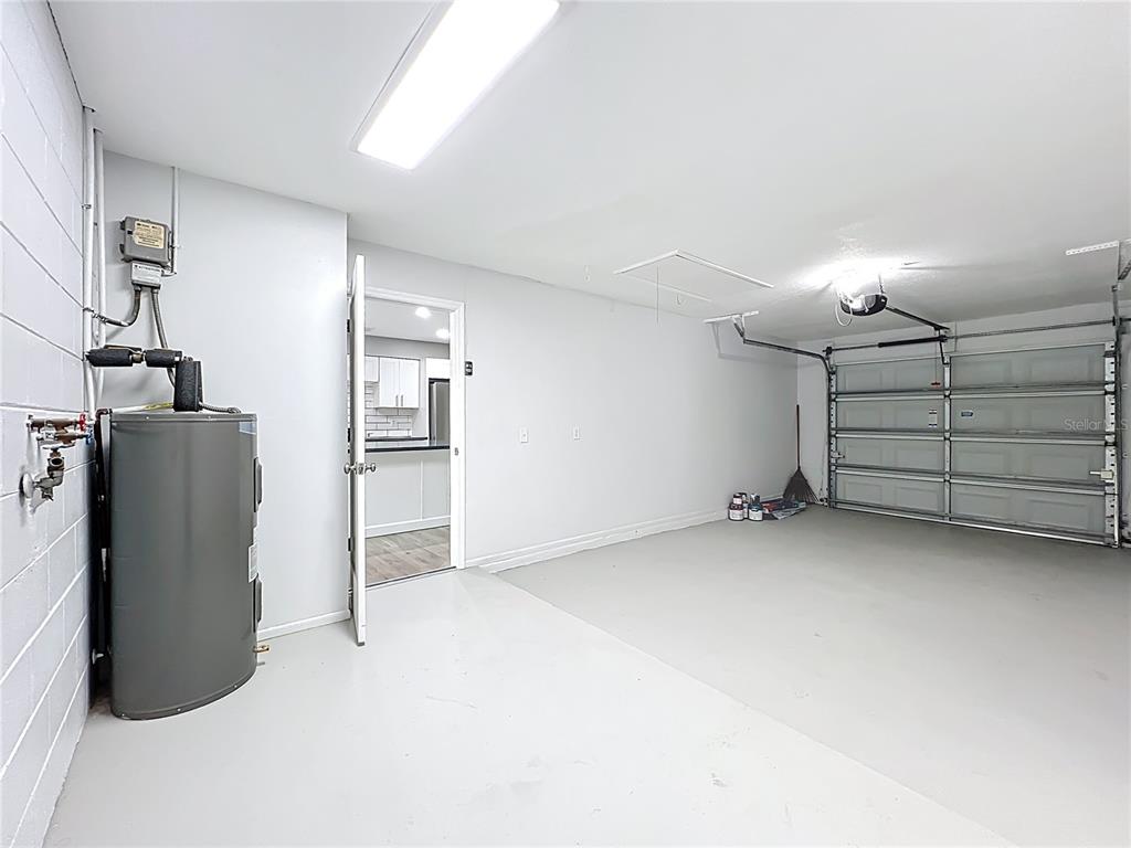 6848 Compass Court Orlando, FL 32810 - Photo 23 of 47 a view of empty room with wooden floor