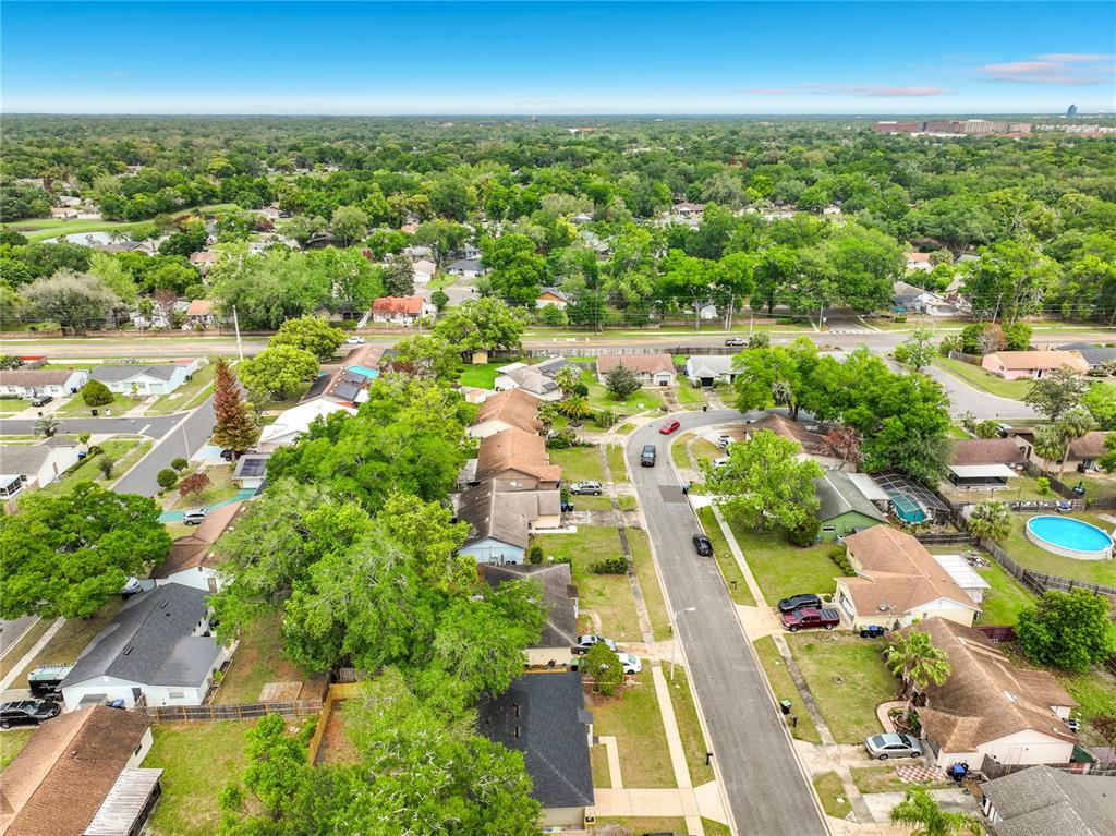 6848 Compass Court Orlando, FL 32810 - Photo 45 of 47 an aerial view of residential houses with outdoor space and street view