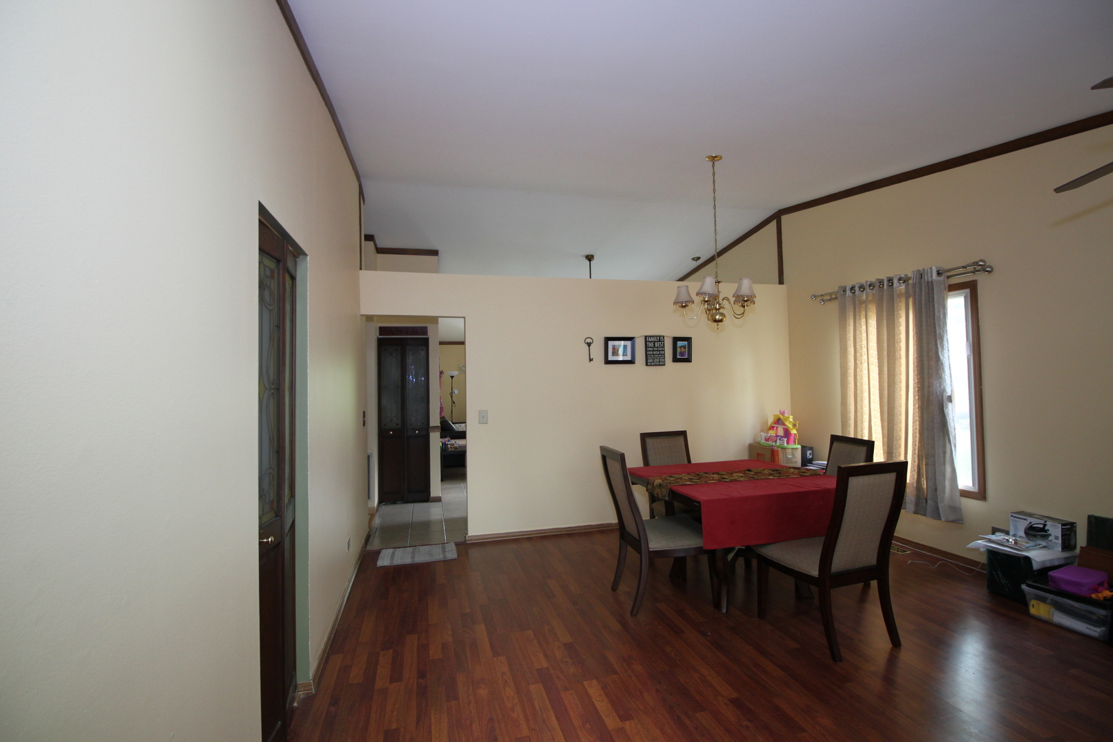 1925 Lisson Road Naperville, IL 60565 - Photo 12 of 18 a view of a dining room with furniture and wooden floor