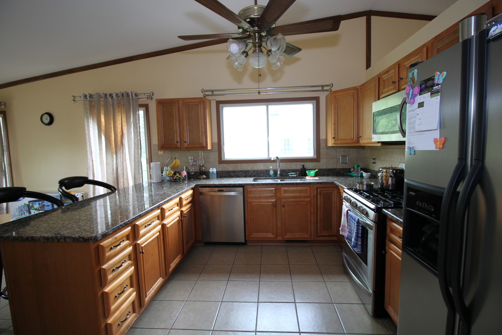1925 Lisson Road Naperville, IL 60565 - Photo 3 of 18 a kitchen with a cabinets appliances and a window