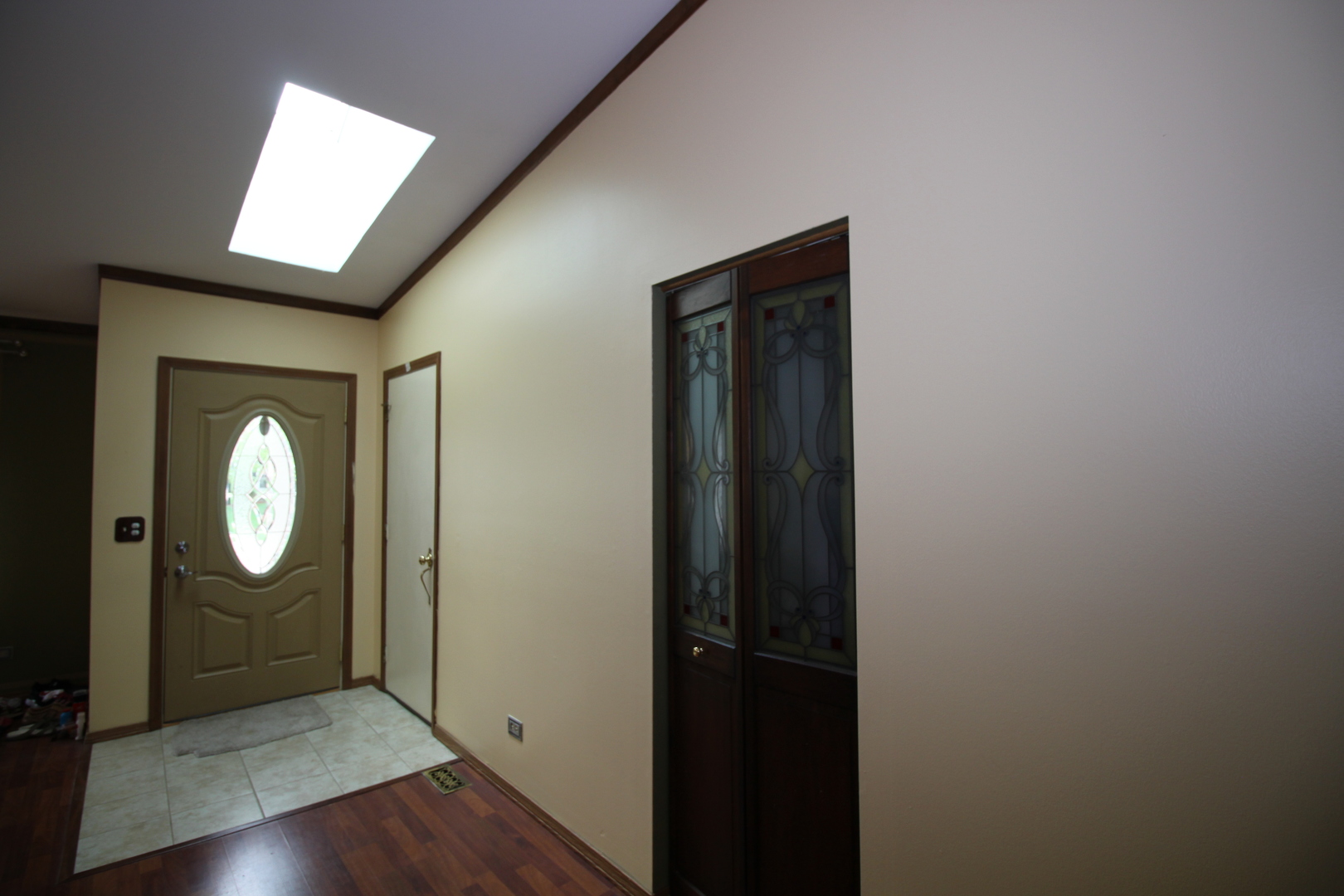 1925 Lisson Road Naperville, IL 60565 - Photo 6 of 18 an entryway at a house with wooden floor
