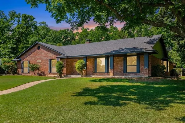 a house view with a garden space