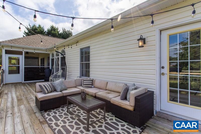 2637 Bybees Church Road Palmyra, VA 22963 - Photo 11 of 50 a balcony with furniture and a potted plant
