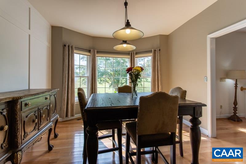 2637 Bybees Church Road Palmyra, VA 22963 - Photo 20 of 50 a dining room with furniture and wooden floor