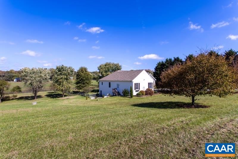 2637 Bybees Church Road Palmyra, VA 22963 - Photo 44 of 50 a front view of a house with a yard
