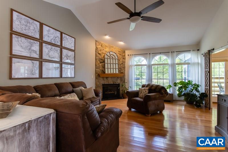 2637 Bybees Church Road Palmyra, VA 22963 - Photo 7 of 50 a living room with furniture large window and flat screen tv