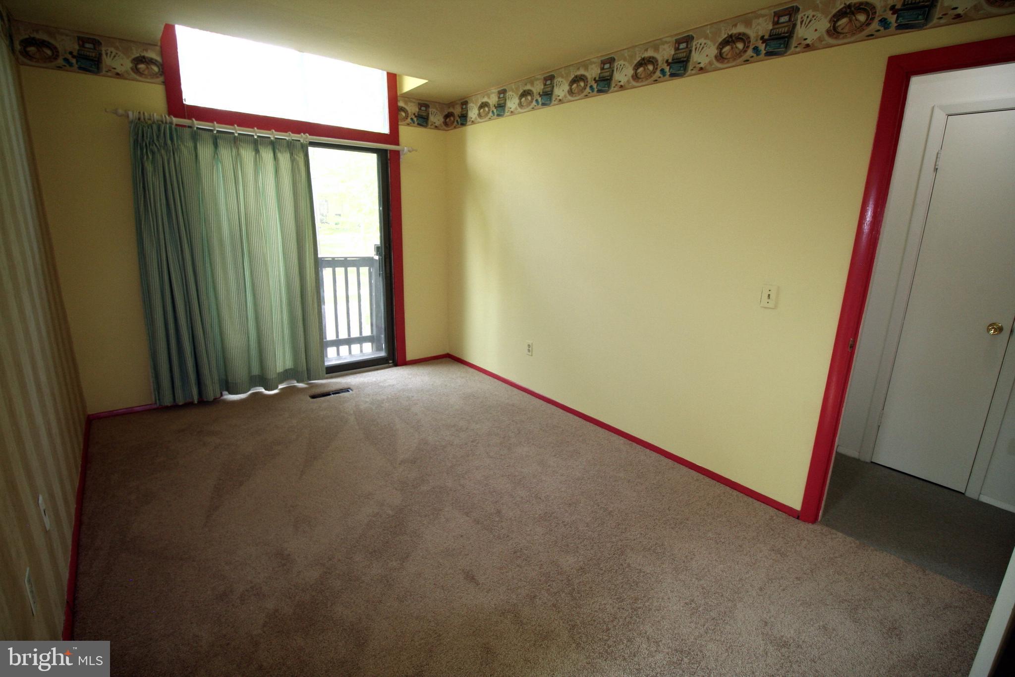 9453 Kilimanjaro Road Columbia, MD 21045 - Photo 26 of 41 Comfy bedroom #2 overlooks pretty front gardens