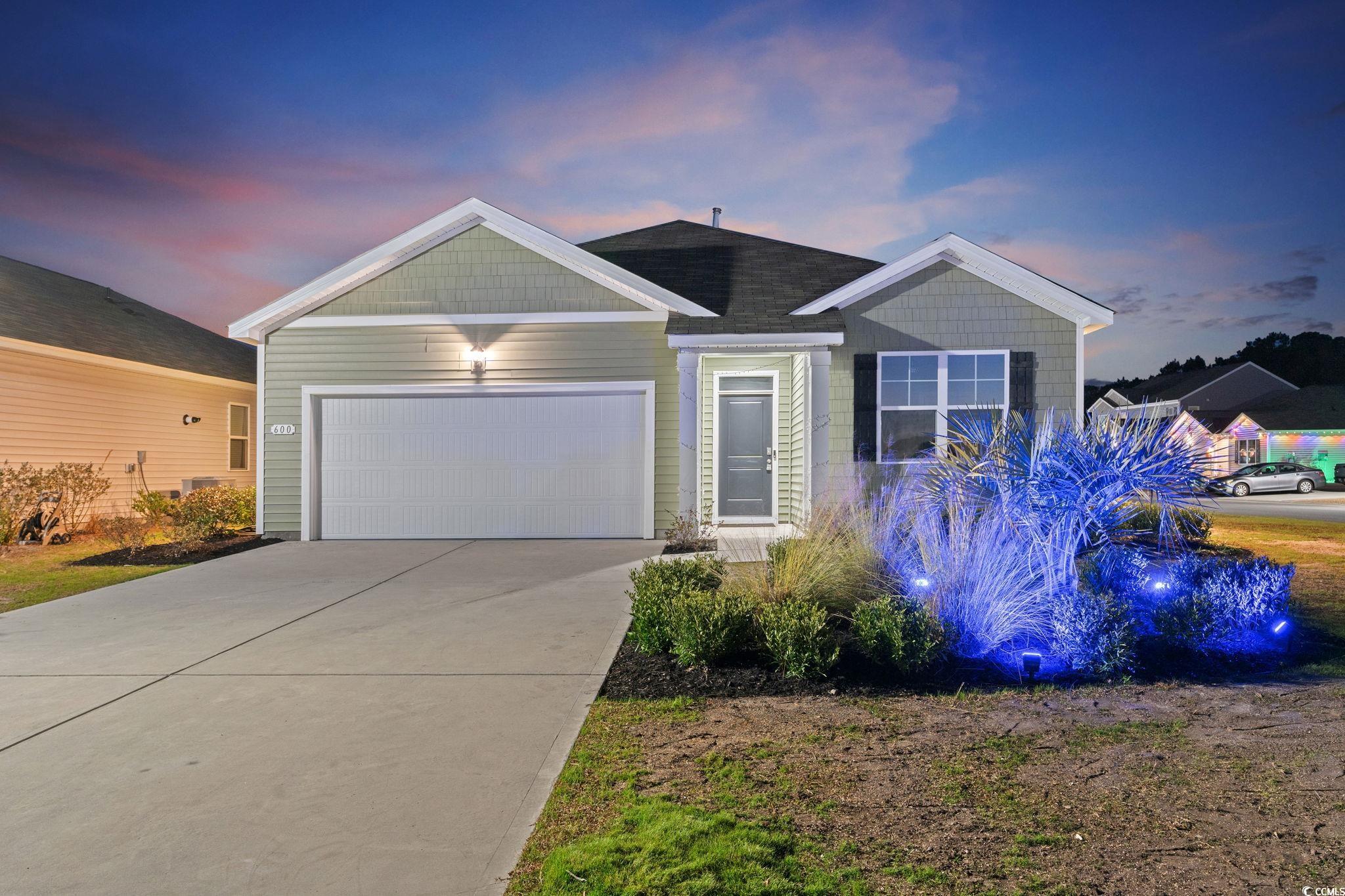 600 Table Rock Court Myrtle Beach, SC 29579 - Photo 3 of 37 View of front of property with driveway and a garage