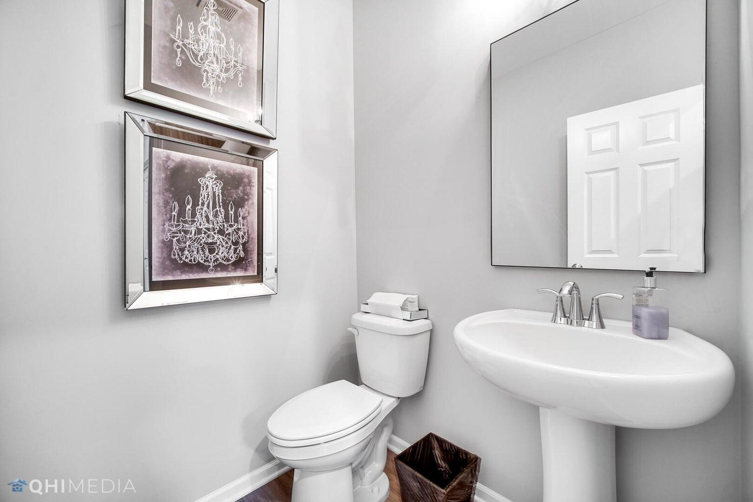 2845 East 105th Avenue Crown Point, IN 46307 - Photo 20 of 24 a bathroom with a toilet and a sink