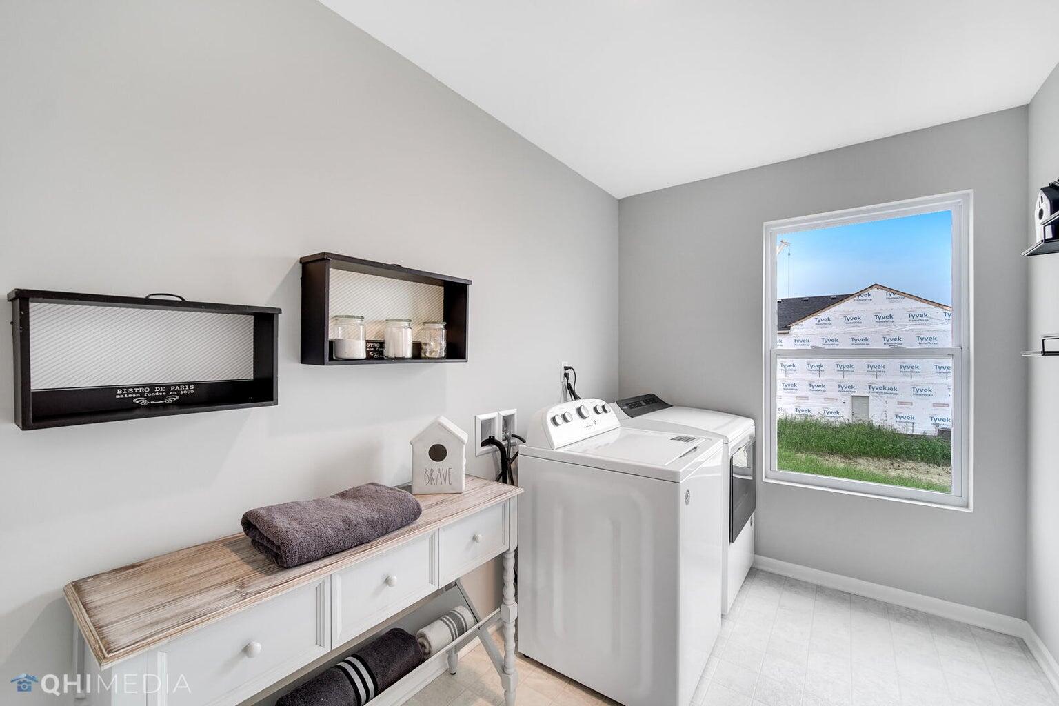 2845 East 105th Avenue Crown Point, IN 46307 - Photo 24 of 24 a living room with furniture and a flat screen tv