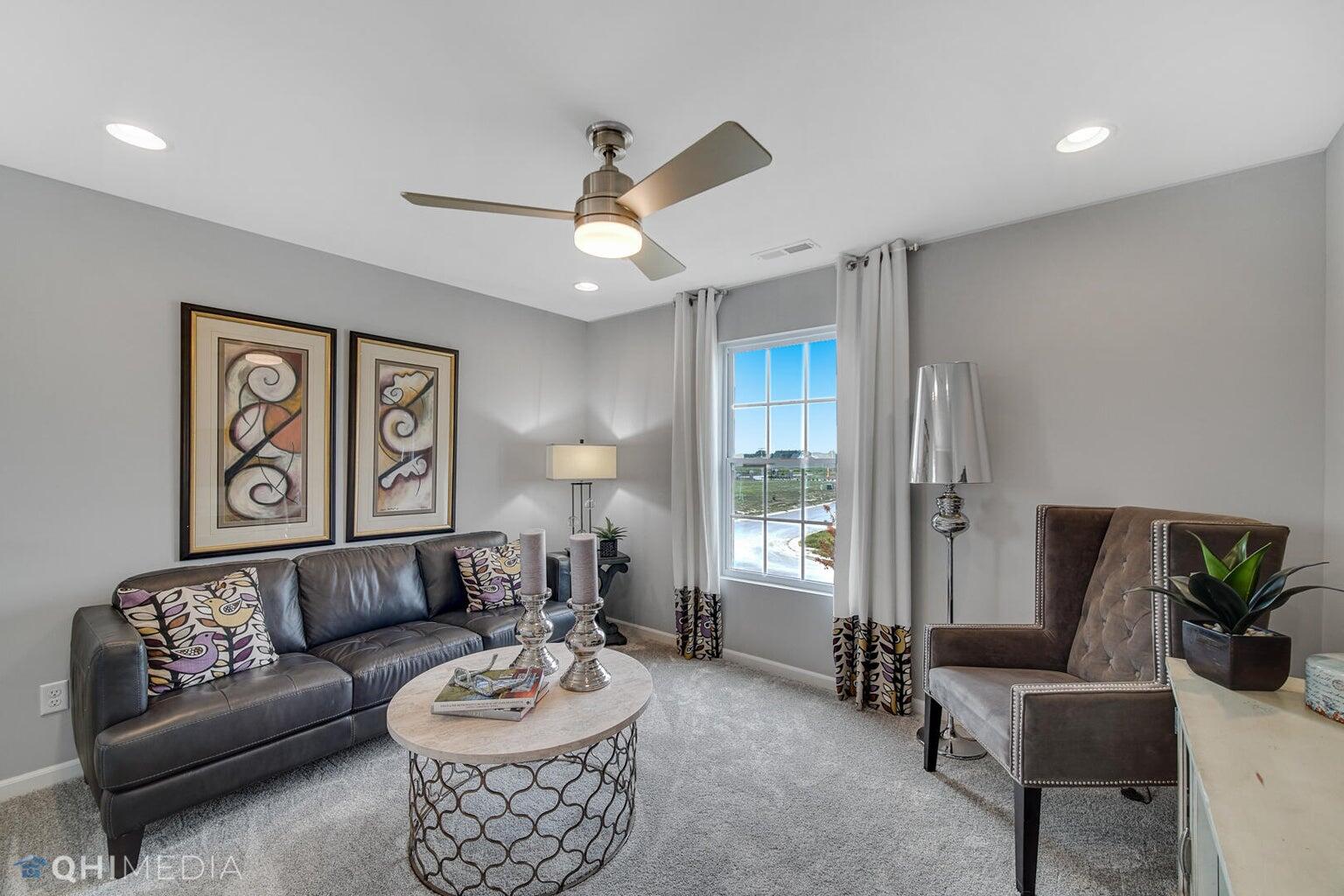 2845 East 105th Avenue Crown Point, IN 46307 - Photo 7 of 24 a living room with furniture and a large window