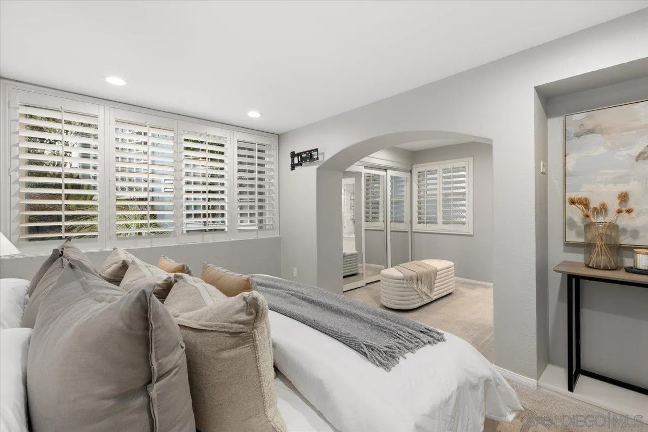 13726 Pine Needles Drive Del Mar, CA 92014 - Photo 29 of 70 a bedroom with furniture and a large window