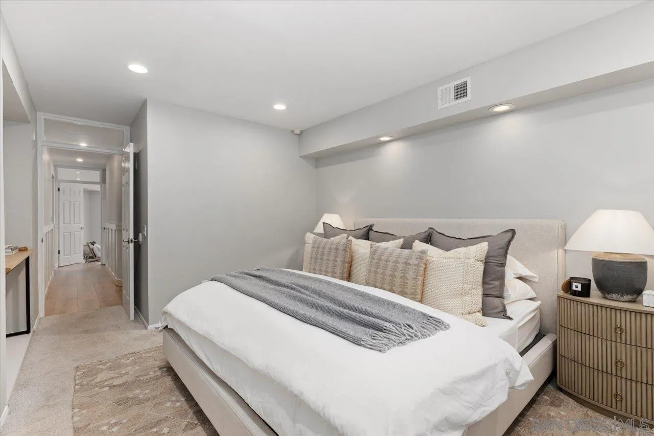 13726 Pine Needles Drive Del Mar, CA 92014 - Photo 30 of 70 a large white bed in a white room