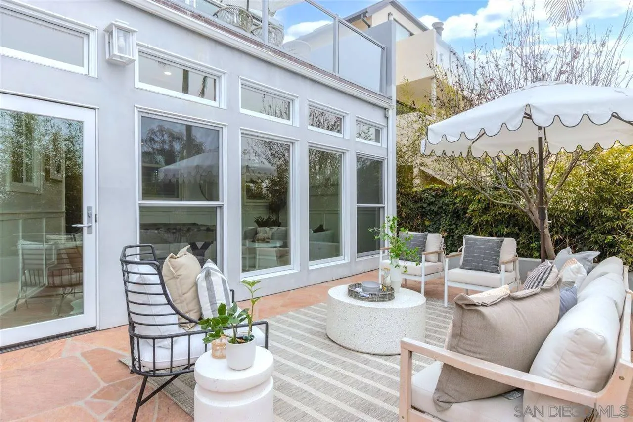 13726 Pine Needles Drive Del Mar, CA 92014 - Photo 48 of 70 a view of a patio with a chairs and table in a patio