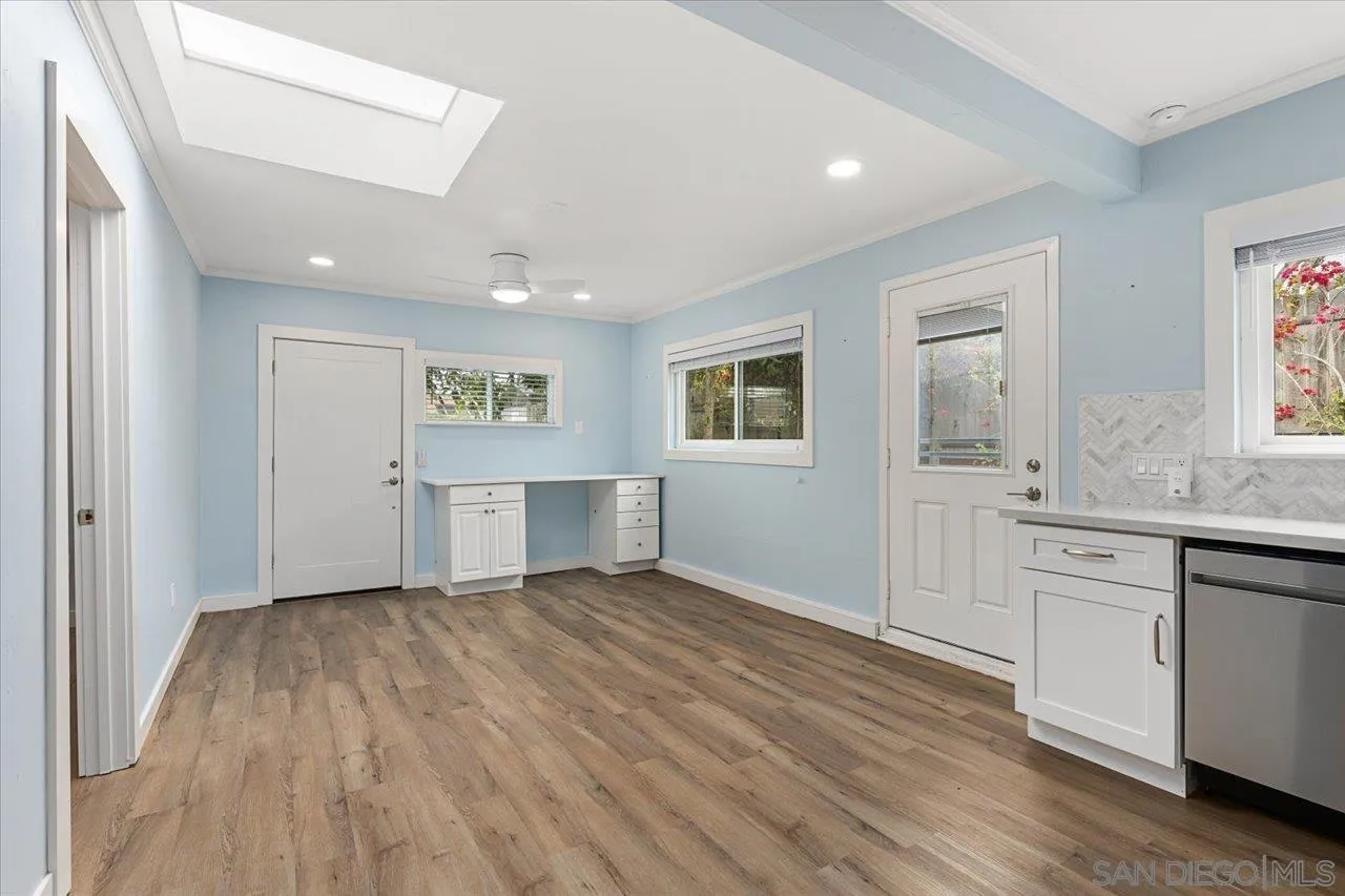 13726 Pine Needles Drive Del Mar, CA 92014 - Photo 56 of 70 a view of a kitchen with wooden floor and windows