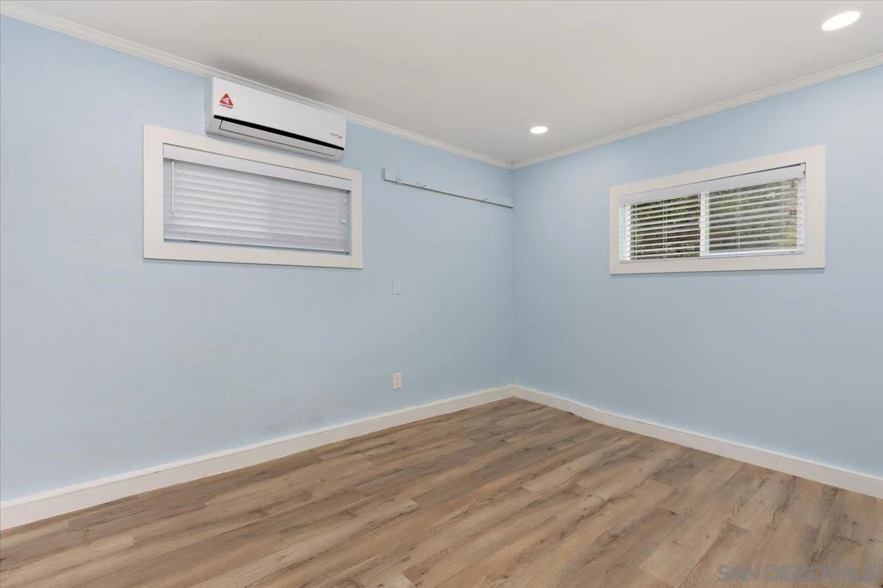 13726 Pine Needles Drive Del Mar, CA 92014 - Photo 61 of 70 a view of a hallway with wooden floor and closet