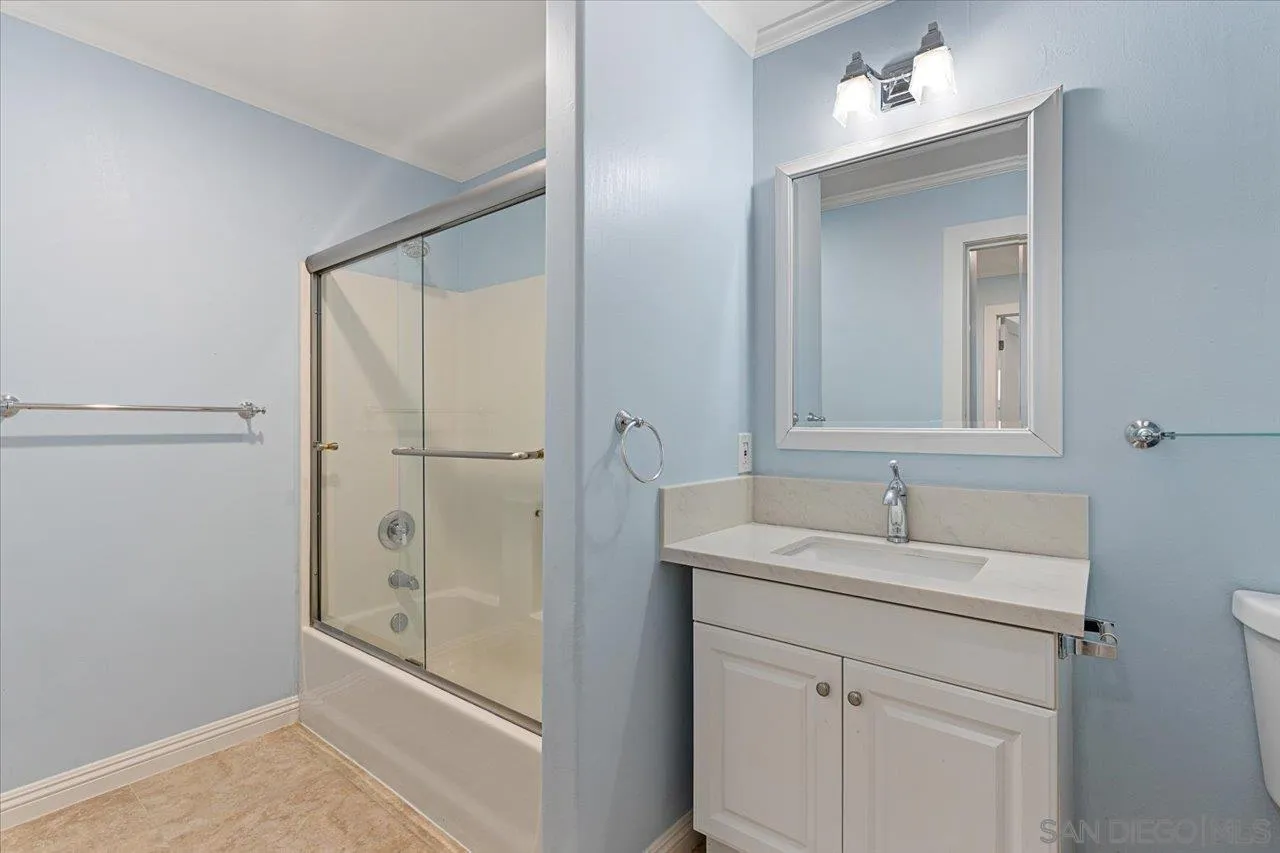 13726 Pine Needles Drive Del Mar, CA 92014 - Photo 62 of 70 a bathroom with a sink and a mirror