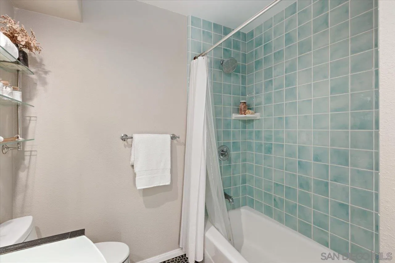 13726 Pine Needles Drive Del Mar, CA 92014 - Photo 63 of 70 a bathroom with a bathtub and toilet