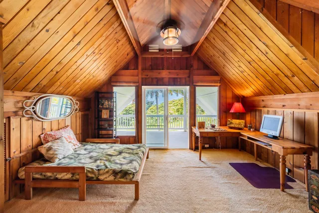 a outdoor space with lots of furniture and a fireplace